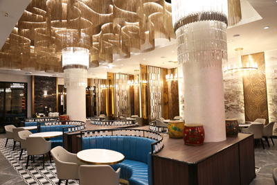 Streeterville dining room with blue booths and cascading chandeliers at MingHin Cuisine