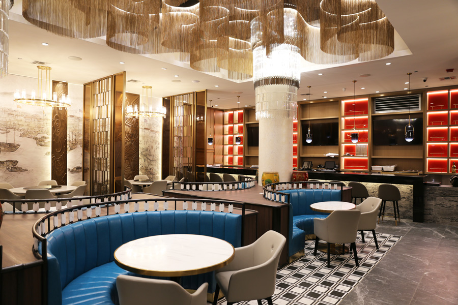 MingHin dining room with blue booths and chandeliers