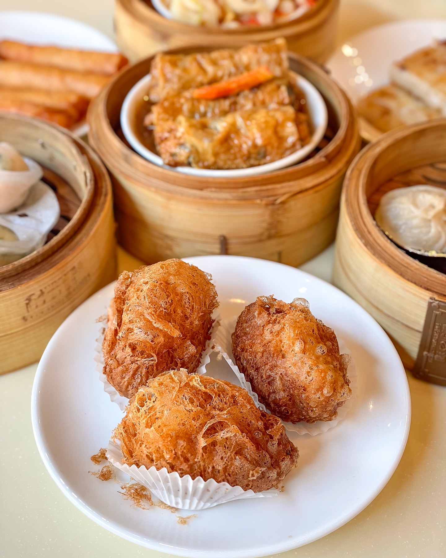 Crispy dim sum with bamboo steamers at MingHin